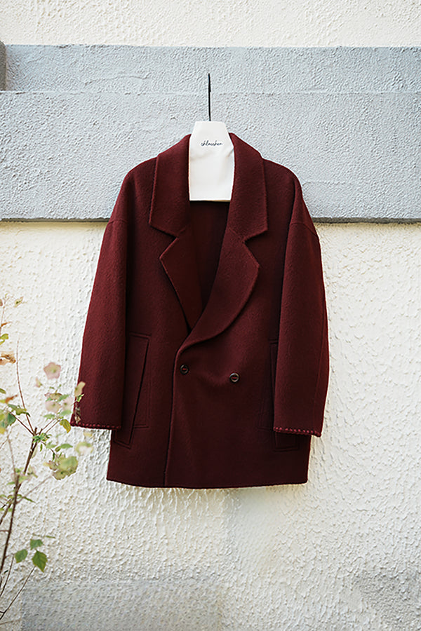 戗驳领中长款大衣