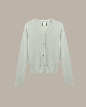 Light gray cardigan on a beige background