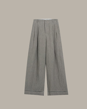 Gray striped pants on a beige background