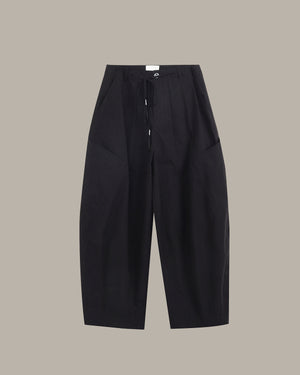 Black pants on a light gray background
