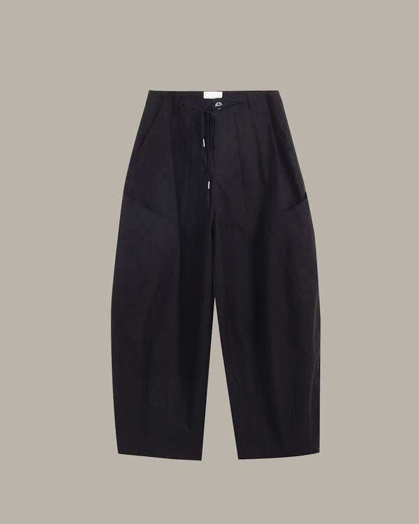 Black pants on a light gray background