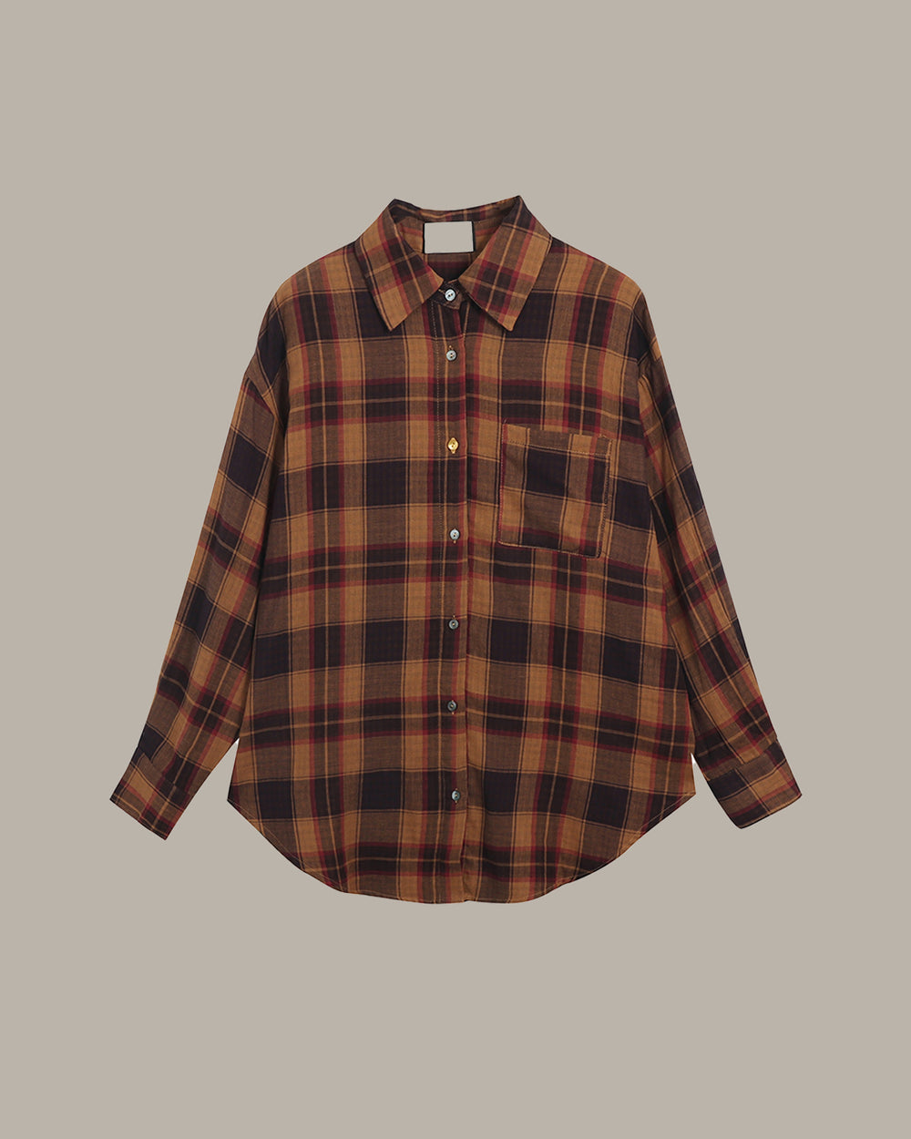 Plaid shirt on a beige background