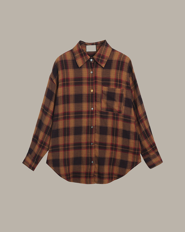 Plaid shirt on a beige background