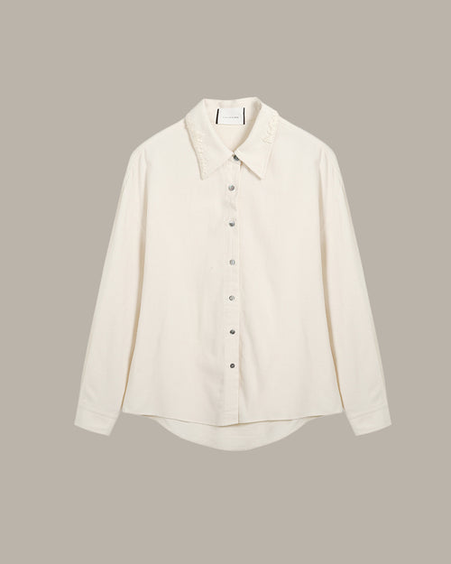 White shirt on a beige background