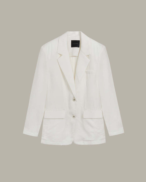 White blazer on a light gray background