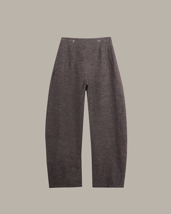 Dark gray pants on a beige background