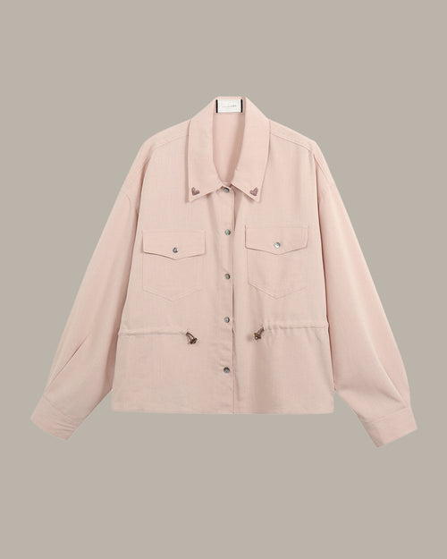 Pink jacket with button details, heart embroidery on collars on a beige background