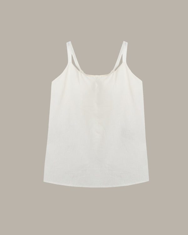 White tank top on a beige background