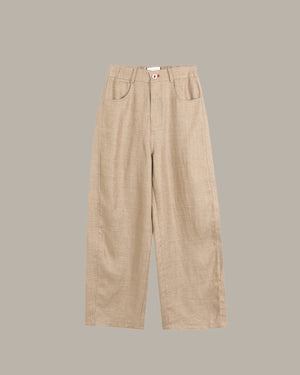 Beige pants on a gray background