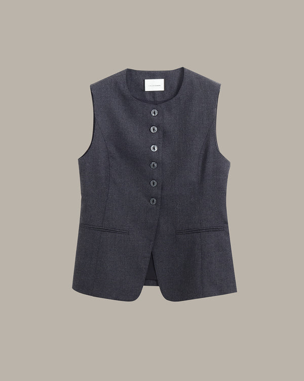 A dark gray sleeveless vest with a button-down front and two front pockets, displayed flat against a solid taupe background.