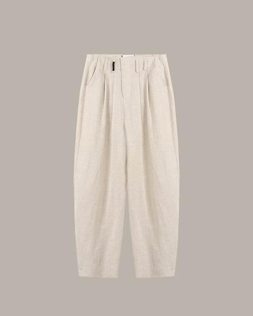 Beige pants on a light gray background