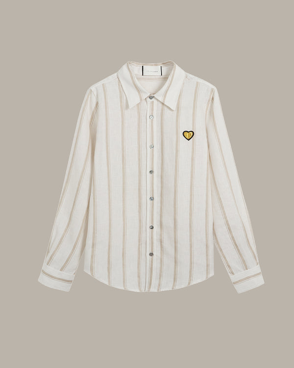 Striped shirt with a heart emblem on a beige background