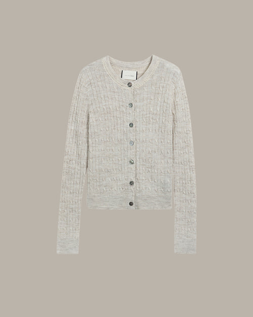 khaki textured cardigan on a beige background
