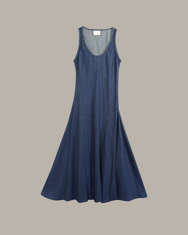 A sleeveless, scoop-neck A-line midi dress in a textured slate blue fabric, displayed flat against a solid taupe background.