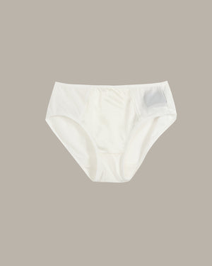 White underwear on a beige background