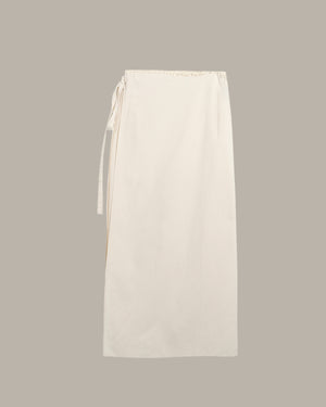 White skirt with a tie detail on a light gray background