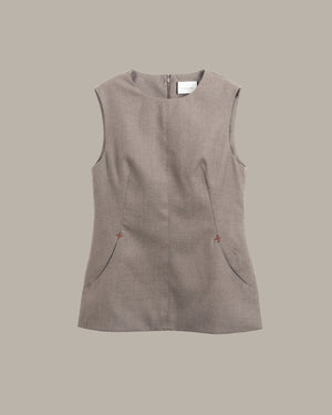 A sleeveless taupe-brown linen-blend top with a round neckline and two small decorative orange buttons on the front, displayed against a solid taupe background.