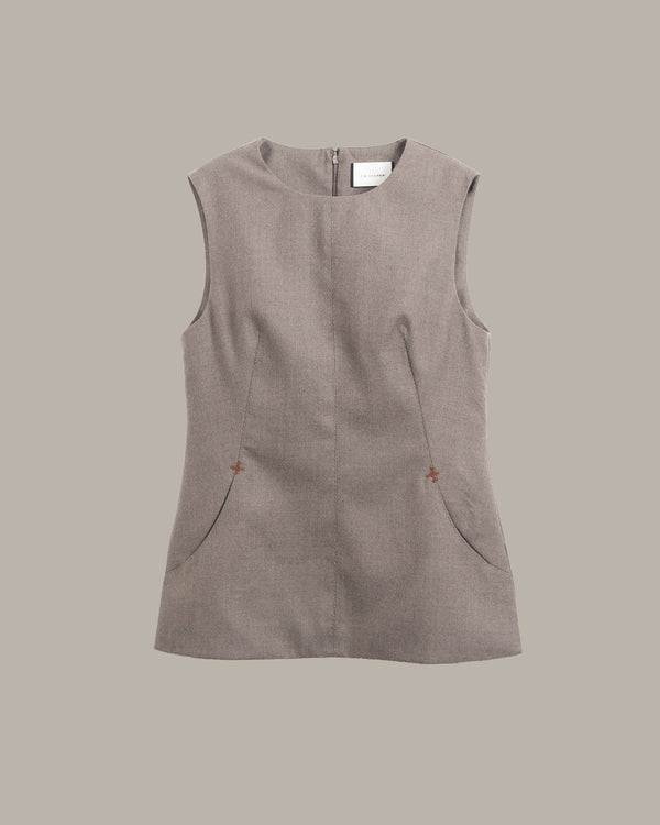A sleeveless taupe-brown linen-blend top with a round neckline and two small decorative orange buttons on the front, displayed against a solid taupe background.