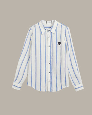 Striped shirt with a heart emblem on a beige background