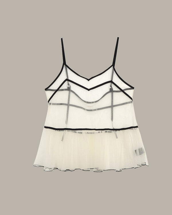 White mesh camisole with black straps on a beige background