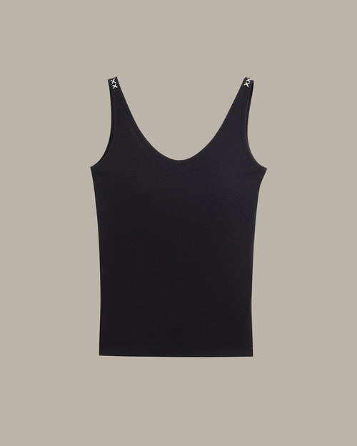 Black tank top on a beige background