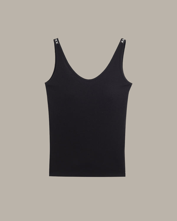 Black tank top on a beige background