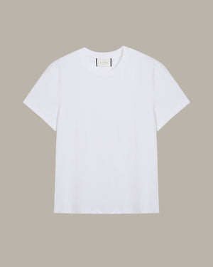 White t-shirt on a beige background