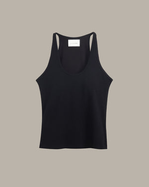 Black tank top on a beige background