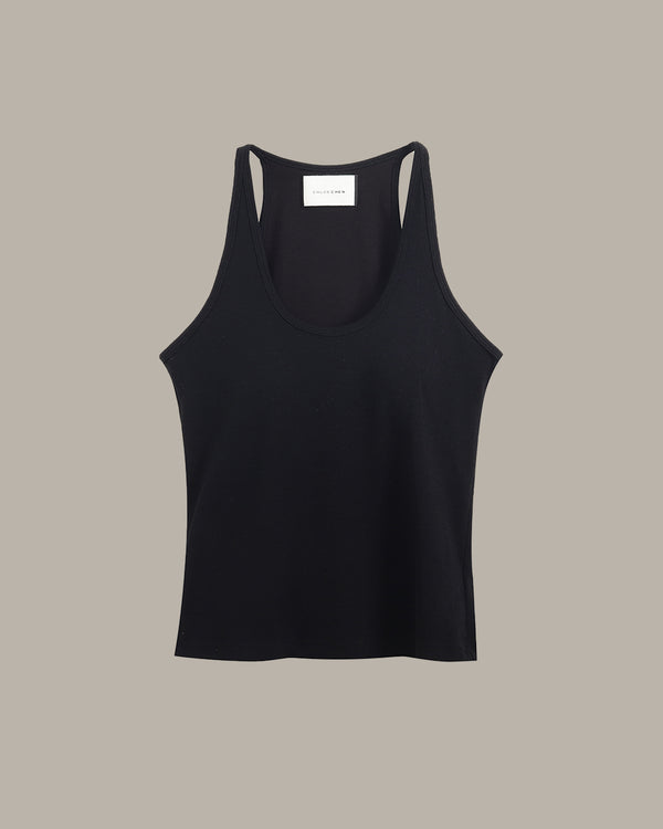 Black tank top on a beige background