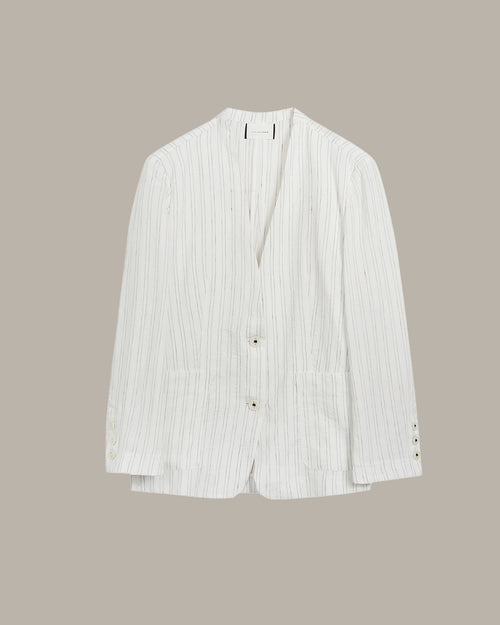 White striped shirt on a beige background