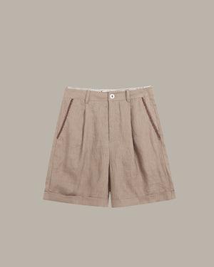 Brown shorts on a beige background