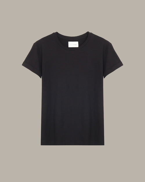 Black t-shirt on a beige background