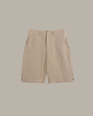 Beige linen shorts with a flat front and side pockets, displayed flat against a solid taupe background.