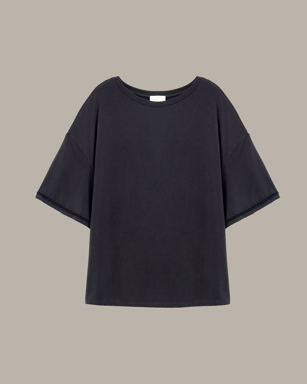 Black t-shirt on a beige background