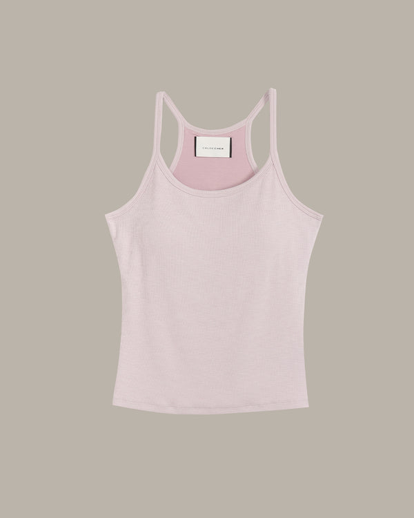 Light pink tank top on a beige background