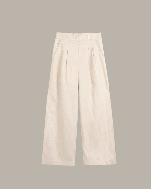 Beige wide-leg pants on a light gray background