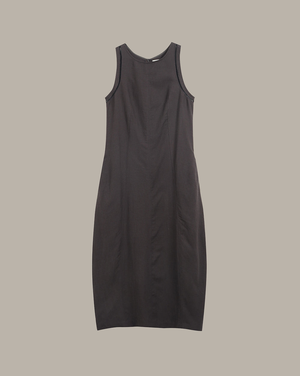 Dark gray sleeveless dress on a beige background