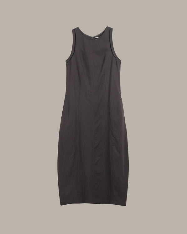 Dark gray sleeveless dress on a beige background