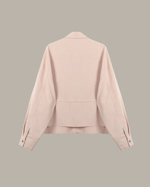 back of a Pink jacket on a beige background