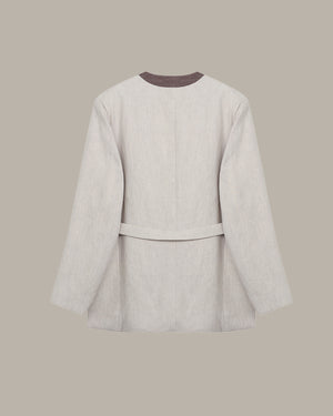 back of a light grey blazer