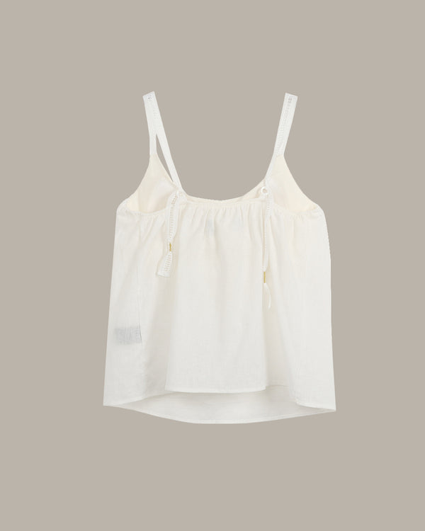 White tank top on a beige background