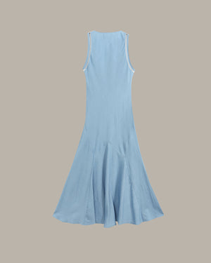 A light blue sleeveless midi dress with a flared skirt, shown from the back against a solid taupe background.