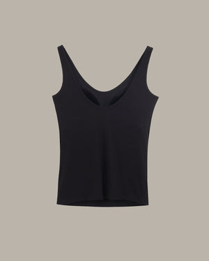 Black tank top on a beige background