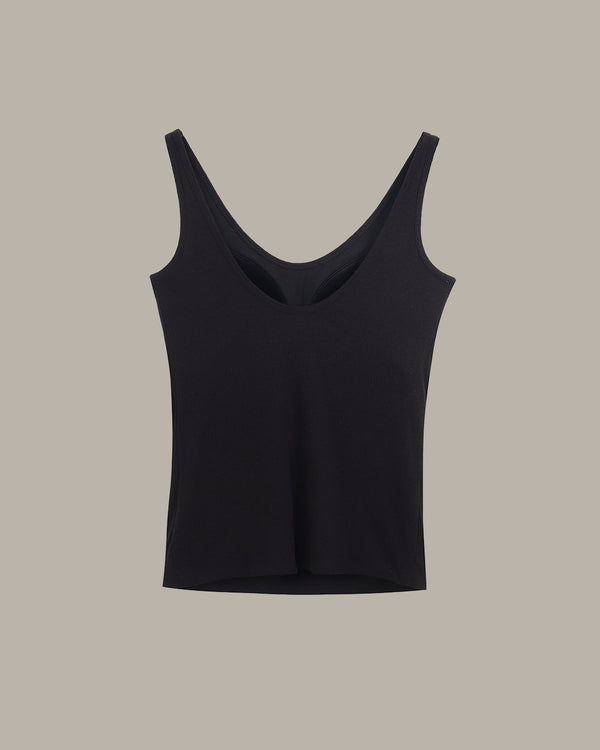Black tank top on a beige background
