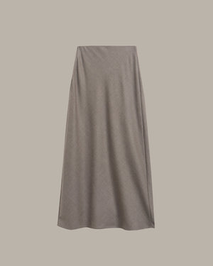 A solid taupe gray midi skirt with a subtle textured knit pattern, shown flat against a solid taupe background.