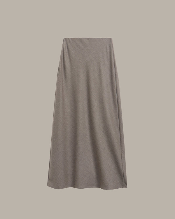 A solid taupe gray midi skirt with a subtle textured knit pattern, shown flat against a solid taupe background.