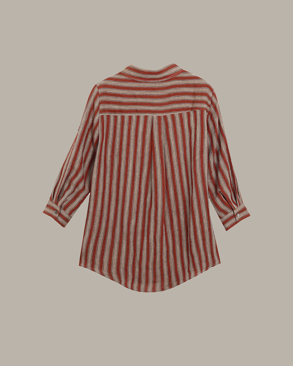 Red and white striped shirt on a beige background