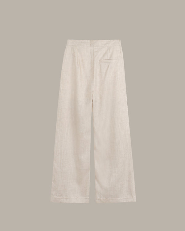 Beige pants on a light gray background