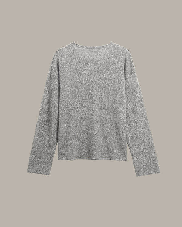A light gray heathered knit long-sleeve top with a wide crew neckline, displayed flat against a solid taupe background.