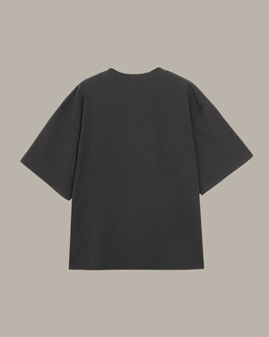 dark gray t-shirt on a beige background